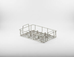 Shallow rectangular stainless steel wire basket with internal compartment dividers and side handles, on a grey gradient background