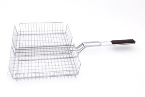 Chrome wire BBQ grilling basket with deep sides, centre divider, and dark wooden handle on a white background