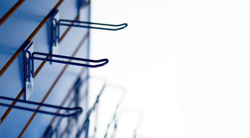 Wire grid display with metal hooks for retail merchandise